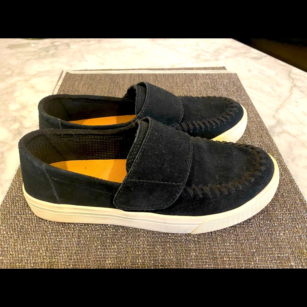 Tom’s ladies size 7.5 like new black suede with Velcro strap.